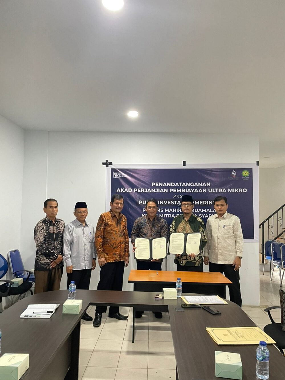 PT LKMS Mahirah Muamalah dan Pusat Investasi pemerintah Tanda Tangan Perjanjian Ultra Mikro Bersama