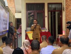 Pj Wali Kota Serah Terima Rumah Layak Huni untuk Warga Batoh