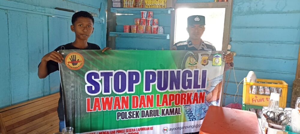 Personel Polsek Darul Kamal Sosialisasi STOP Pungli
