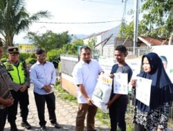 Pj Bupati Aceh Besar Salurkan Bantuan Pangan Kepada 3.389 KPM