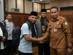 Plh Asisten III Sekda Aceh Jemput Kepulangan Rombongan MTQ Korpri VII Nasional di Bandara SIM